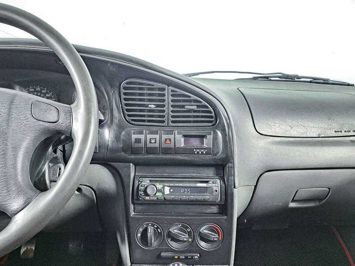 Купить Kia Spectra с пробегом. Фото: #8