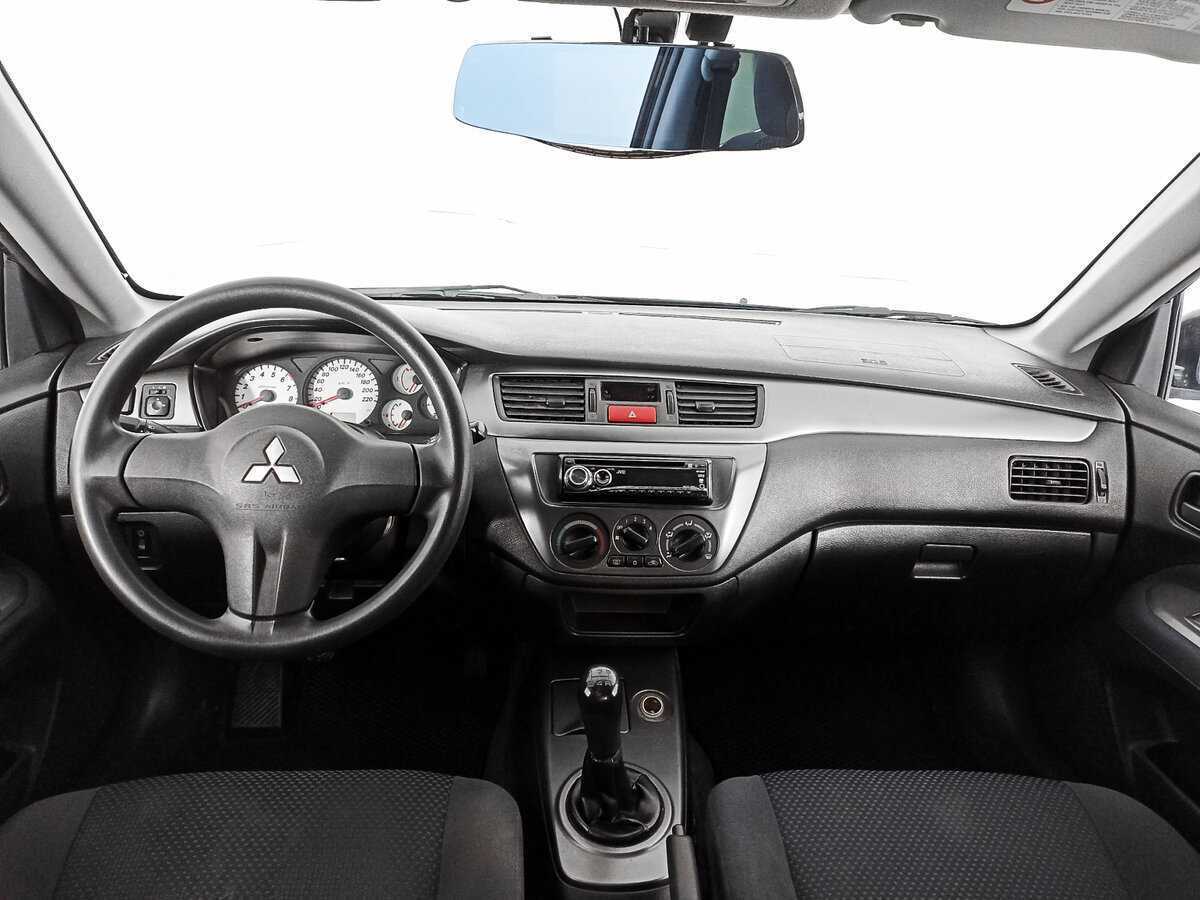 Купить Mitsubishi Lancer с пробегом. Фото: #9