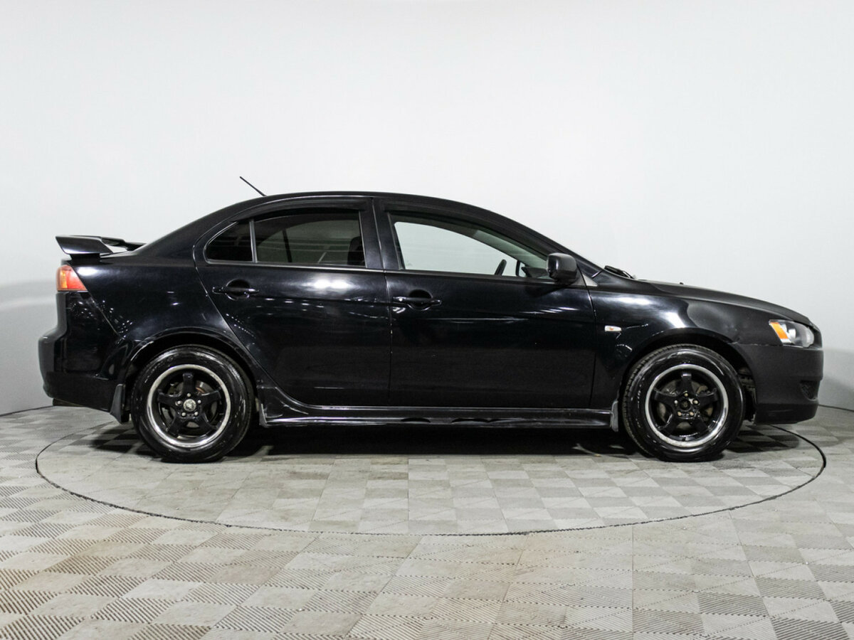 Купить Mitsubishi Lancer с пробегом. Фото: #3