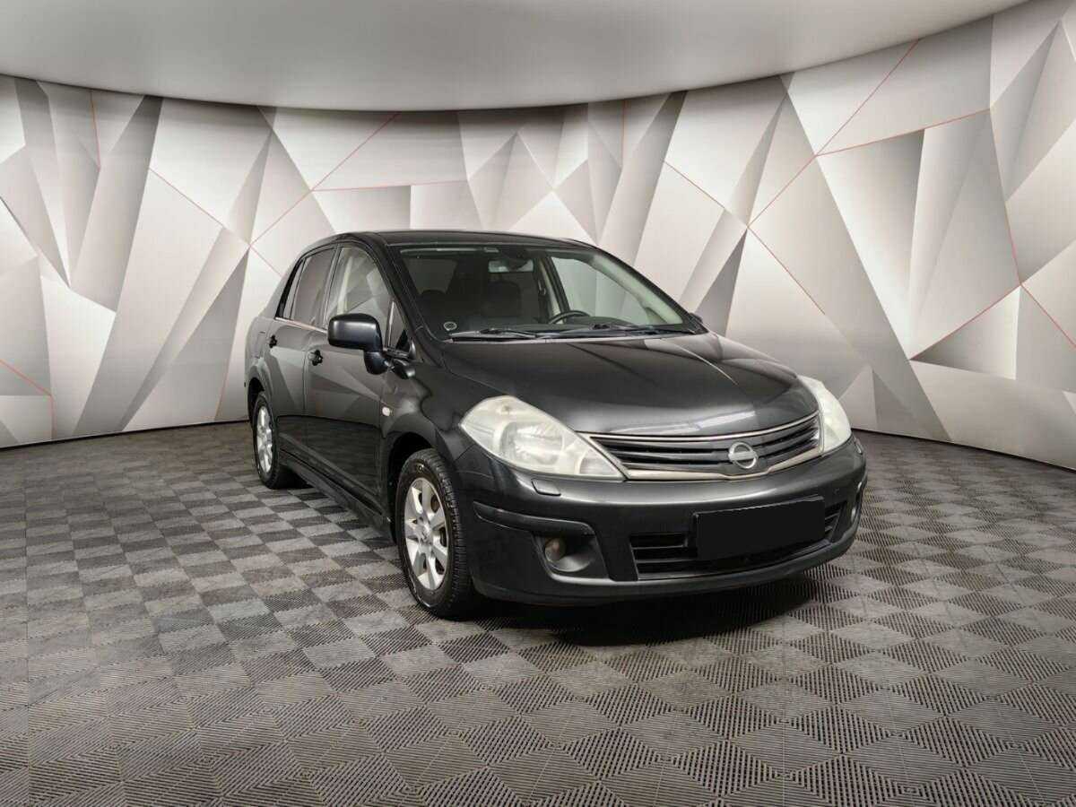 Купить Nissan Tiida с пробегом. Фото: #2