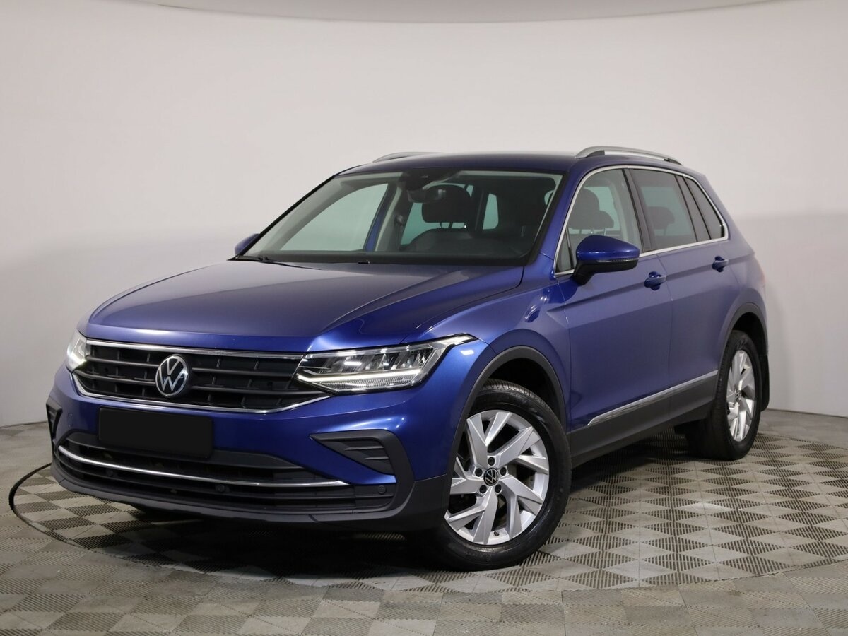 Купить Volkswagen Tiguan с пробегом. Посмотреть фото