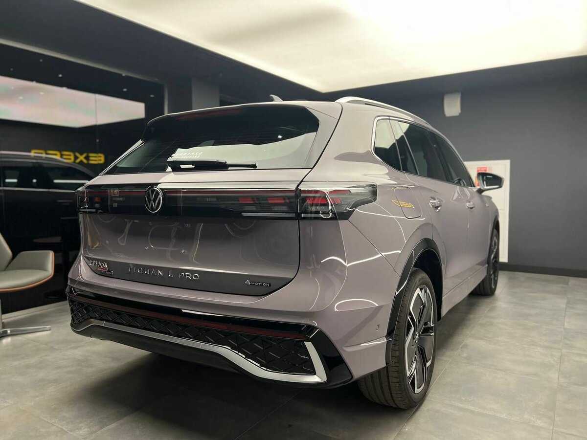 Купить Volkswagen Tiguan с пробегом. Фото: #2