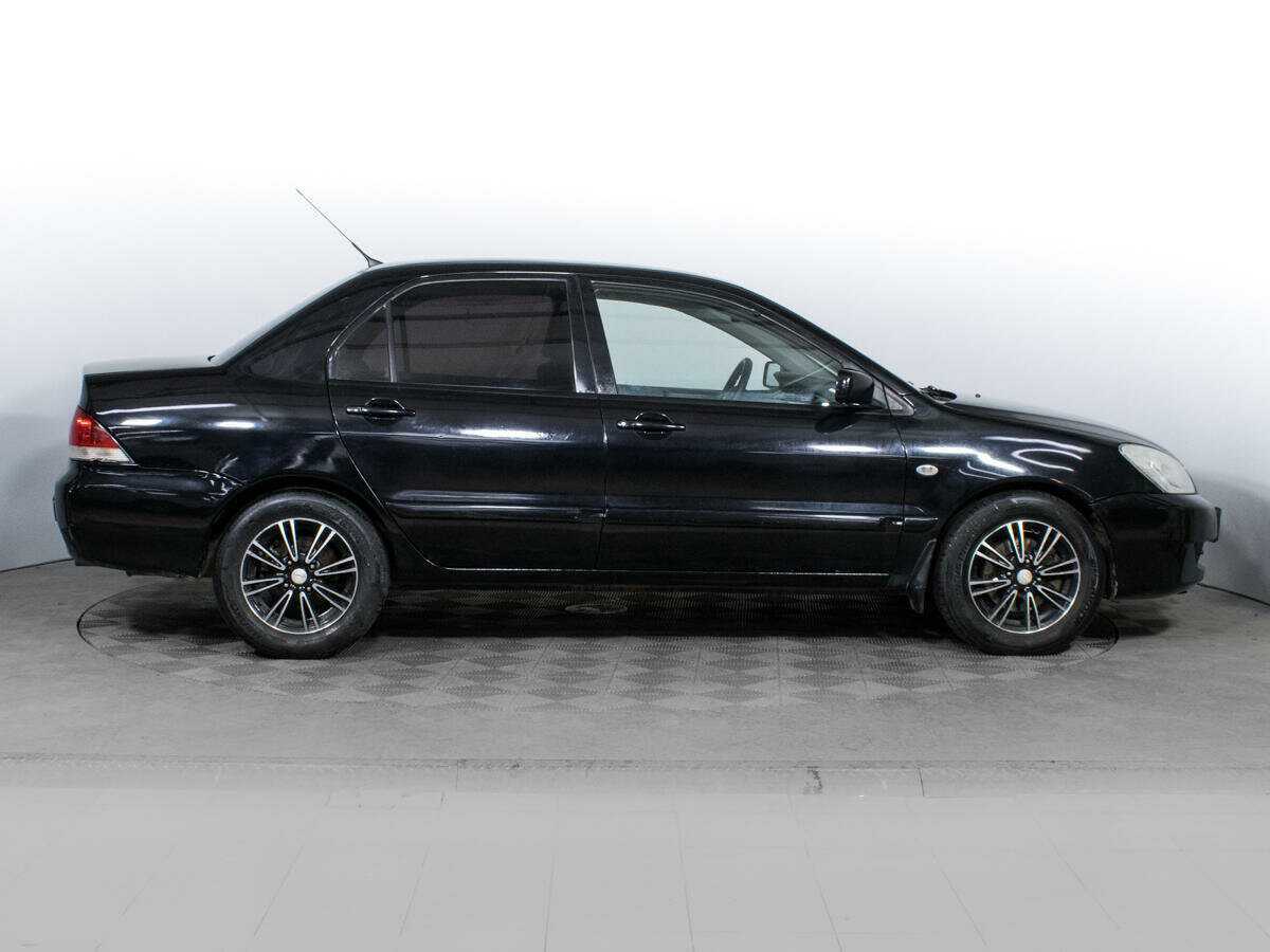 Купить Mitsubishi Lancer с пробегом. Фото: #3