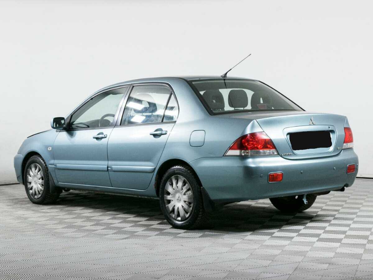 Купить Mitsubishi Lancer с пробегом. Фото: #6