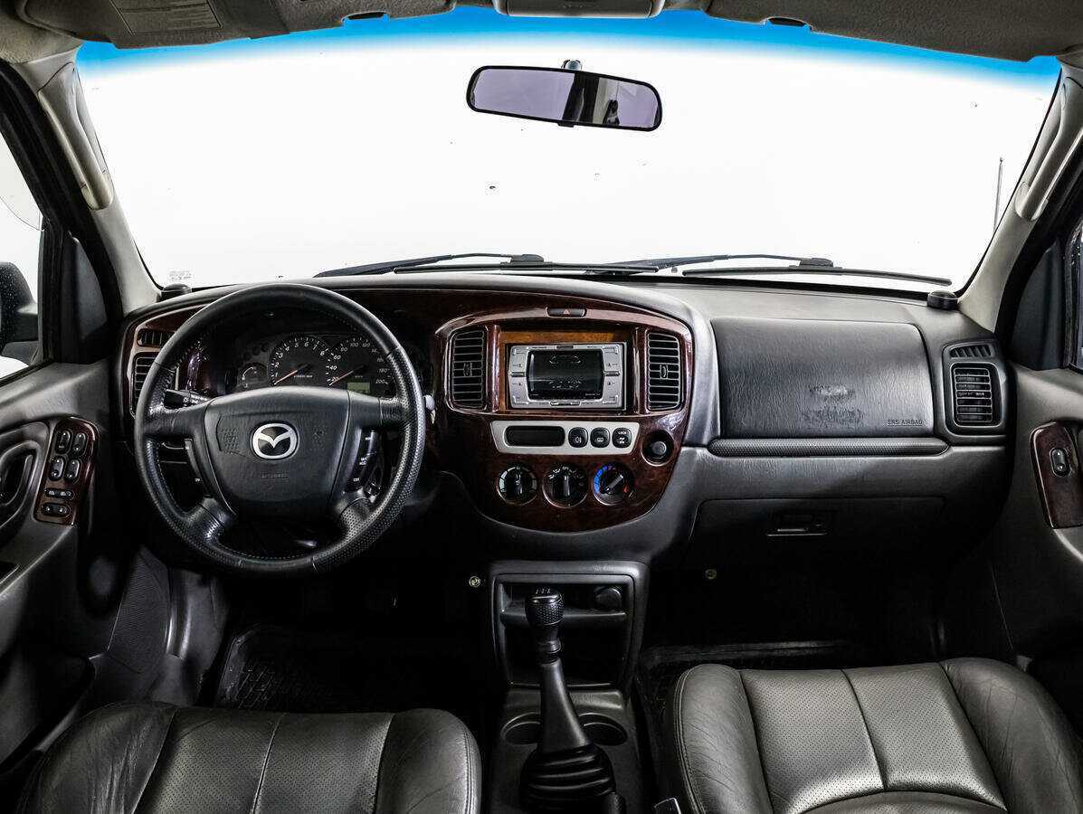 Купить Mazda Tribute с пробегом. Фото: #10