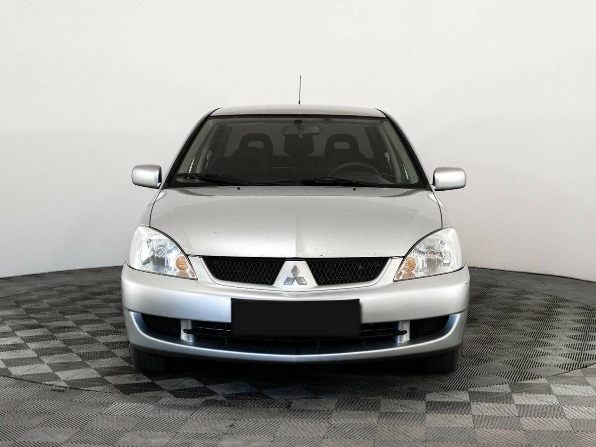 Купить Mitsubishi Lancer с пробегом. Фото: #1