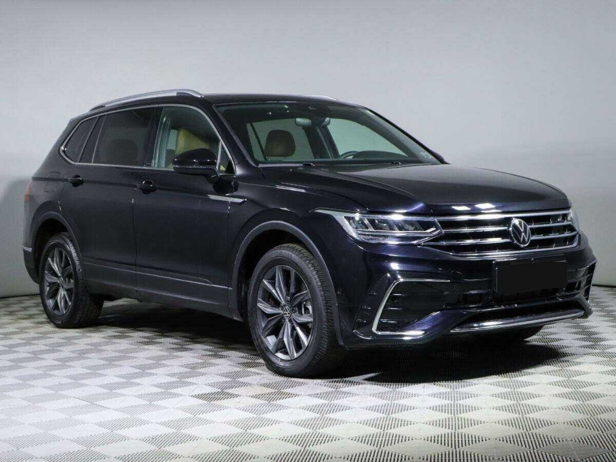 Купить Volkswagen Tiguan с пробегом. Фото: #2