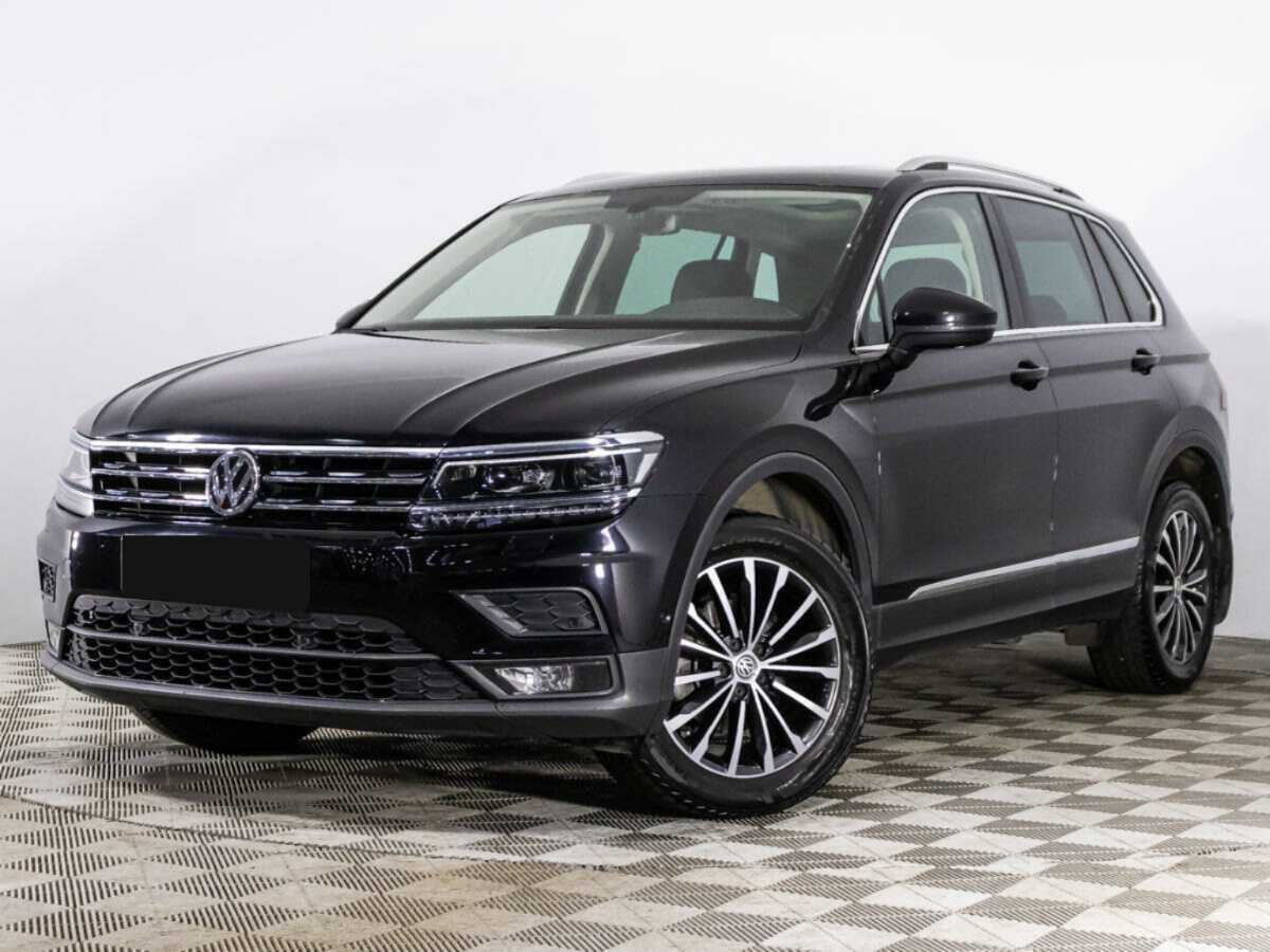 Купить Volkswagen Tiguan с пробегом. Посмотреть фото