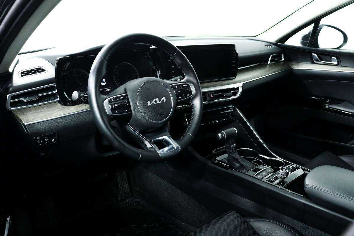 Купить Kia K5 с пробегом. Фото: #12