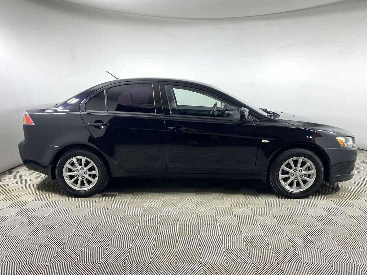 Купить Mitsubishi Lancer с пробегом. Фото: #1
