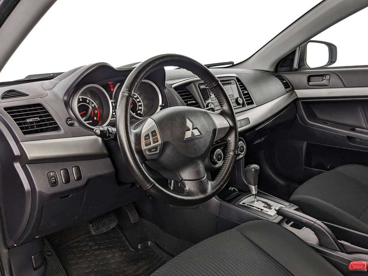 Купить Mitsubishi Lancer с пробегом. Фото: #9