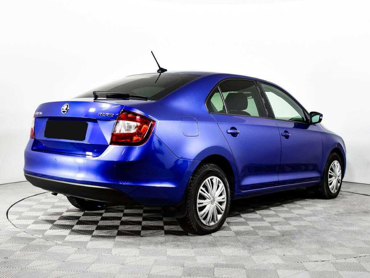 Купить Skoda Rapid с пробегом. Фото: #4
