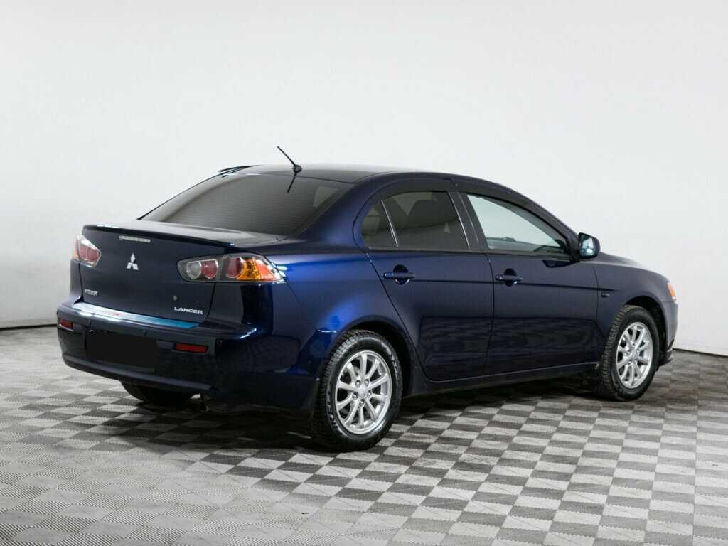 Купить Mitsubishi Lancer с пробегом. Фото: #2
